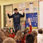 Ultramarathoner and youth mental health advocate Greg Nance answers questions from students at Saint Cecilias Catholic School on Teambuilding Jan. 31. Nancy Treder/Kitsap News Group Photos