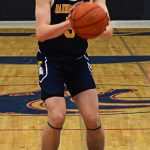 Noah Davis and the Bainbridge Spartans struggled offensively in the pigtail matchup. Nicholas Zeller-Singh/Kitsap News Group Photos