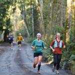 Runners come out of the Grand Forest on to McRedmond Road.