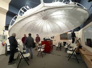 Nancy Treder/Kitsap News Group
Members of the Battle Point Astronomical Association work under the cloth dome in the John Rudolph Planetarium to prepare the projector for the next show March 11.