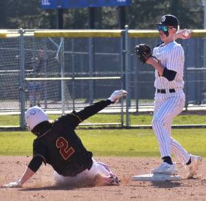 Bainbridges Braden French gets the force out at second base. Nicholas Zeller-Singh/Kitsap News Group Photos