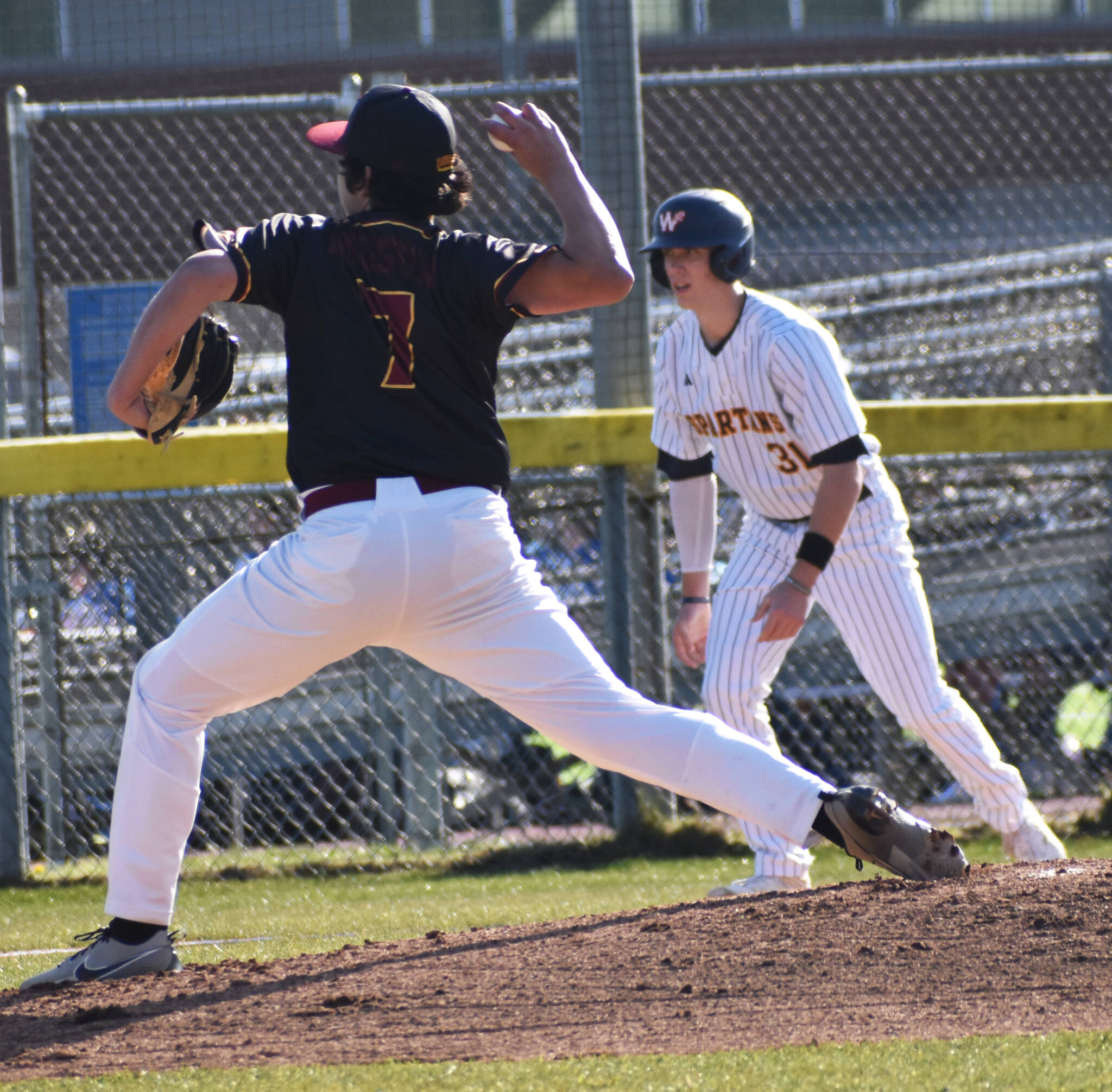 Kingstons Chayton Walker pitches against the Spartans.