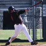 Kingstons Gavin Garner hits a deep ball into the outfield.