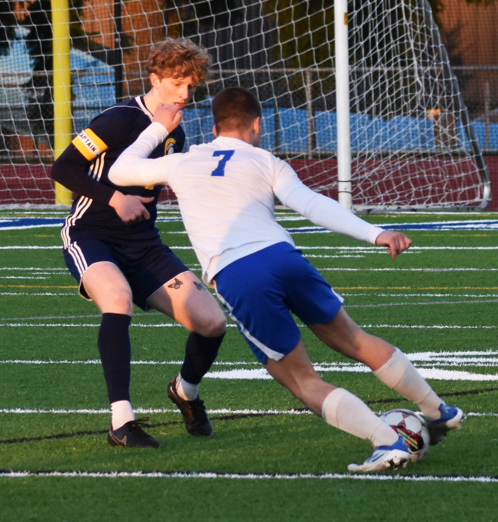 Bremertons Brennan Galloway jukes the Bainbridge defender and attacks the goal.