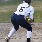 Brearley Jayne-Curfman snags the ball before throwing for the force out.