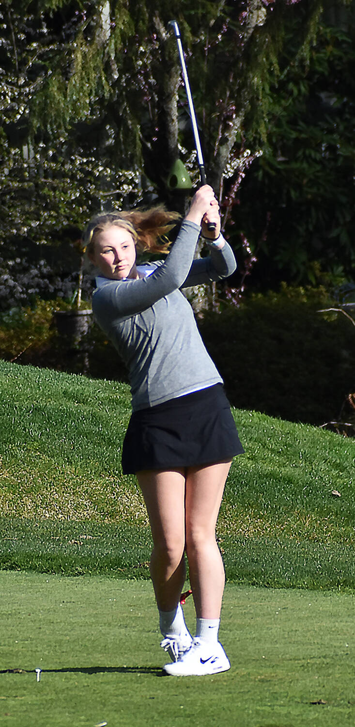 Bainbridges Clarice Telschow watches her shot reach the green on a par 3.