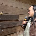 Ken Matsudaira, director of Community and Cultural Programs at the Bainbridge Island Art Museum, reads the last of the 276 names on the memorial wall. Nancy Treder/Kitsap News Group Photos