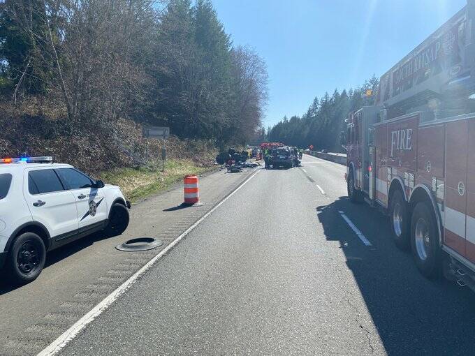 Officials respond to the crash site involving a stolen pickup from Tacoma. State Patrol courtesy photo