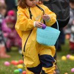 Isabel Erickson, 2 1/2, finds an egg during her first egg dash.