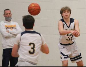 Steve Haizlip coaching in a game last year. He recently resigned. File photo