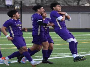 Diego DeLuna and the North Kitsap Vikings celebrate after scoring a goal. Nicholas Zeller-Singh/Kitsap News Group Photos
