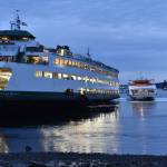 The first group of 243 passengers departs the Walla Walla on a foot ferry bound for Bremerton.