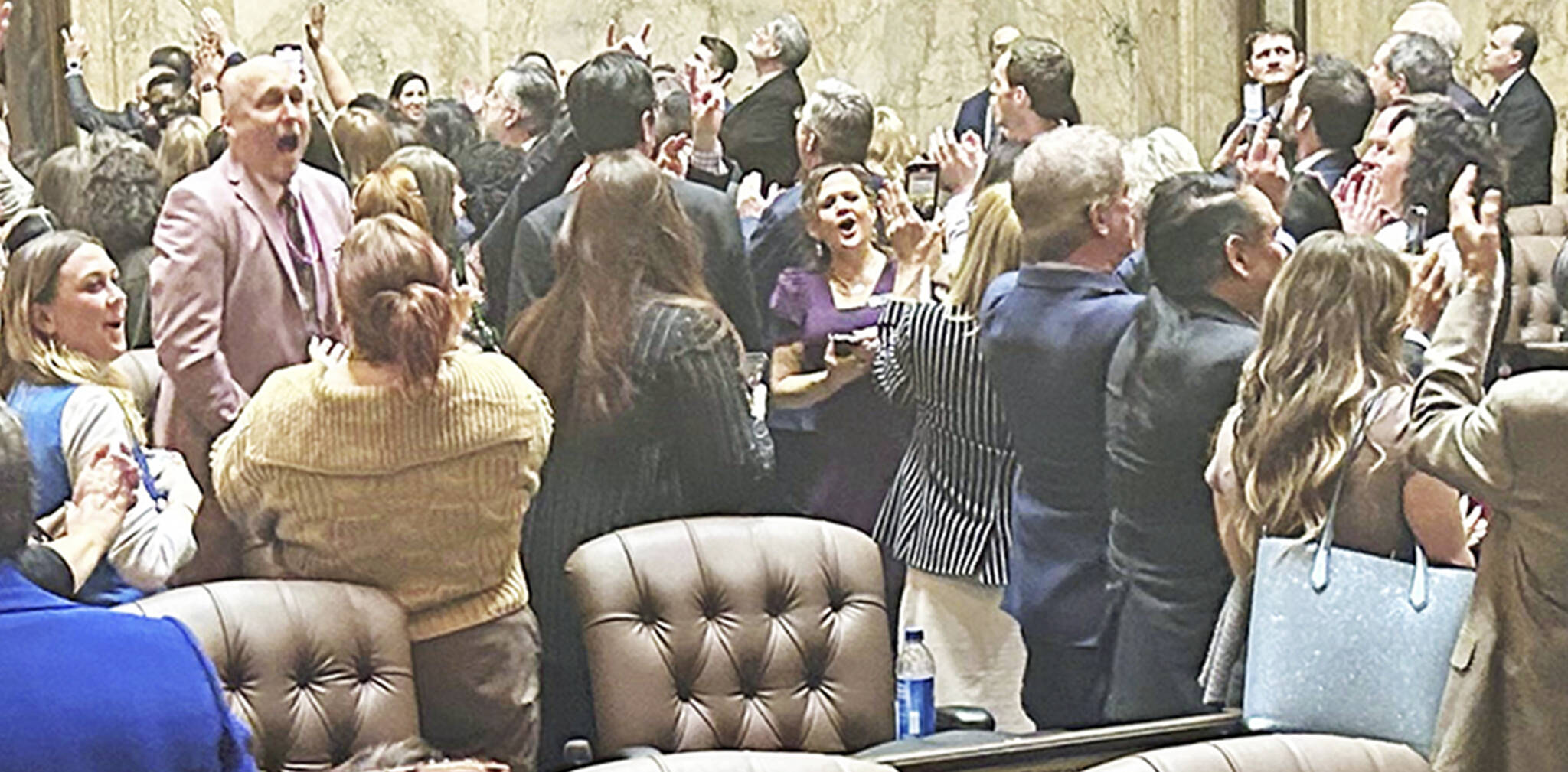 House members celebrate the end of the session, but they likely will be called back. Alexandria Osborn courtesy photo