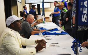 Fans line up to get autographs of current and former Seahawks players. Nicholas Zeller-Singh/Kitsap News Group Photos