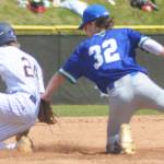 McCrea Curfman slides safely into second base.