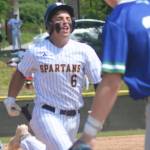 Duncan Bos runs to third base after smashing a triple.