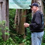 Al Phillips at the entrance to the garden.