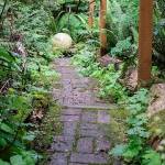 Visitors walk on a picturesque trail through the property.
