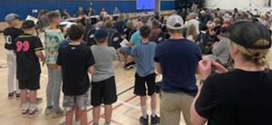 Youth and adults pack the gym while Sakai Park is discussed. Adam Hunt courtesy photo