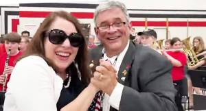 Kingston Middle School band director Jeff Haag and his wife Kathleen dance to 'Louie Louie' as his final sendoff. NKSD courtesy photos