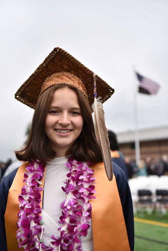 Els Cajune wears a graduation cap made of cedar bark. She is a tribal member of the White Earth Band of the Minnesota Chippewa Tribe.