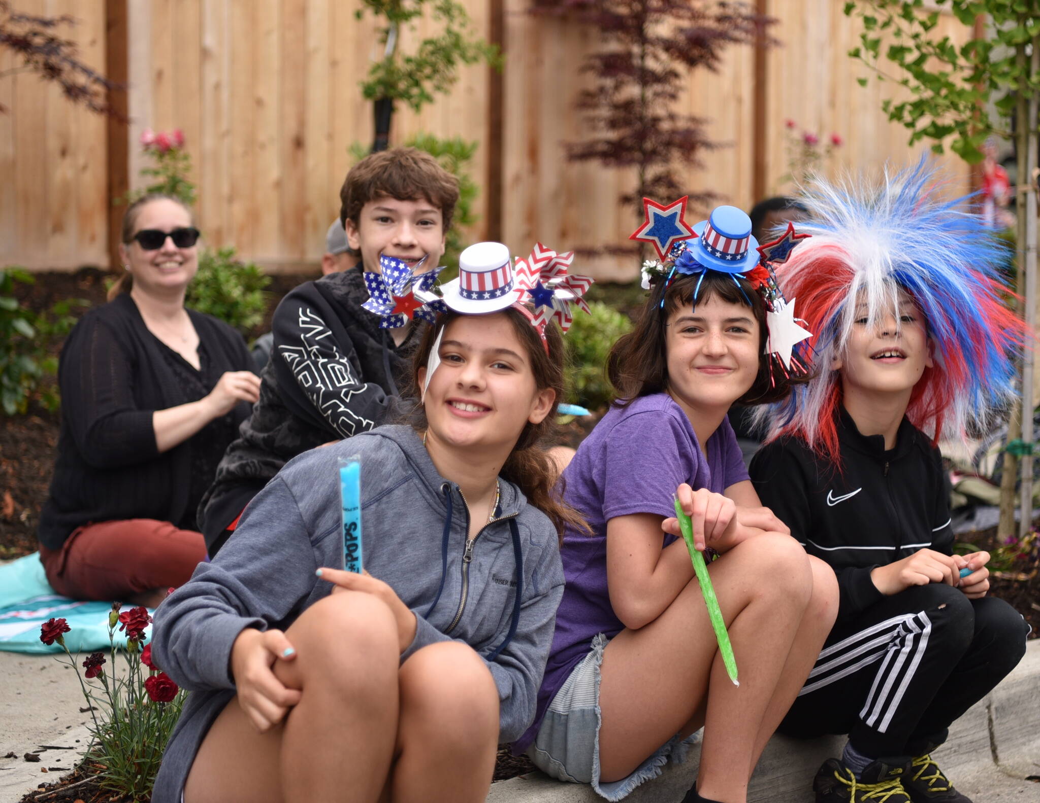 Young people at the parade who are watching also can enjoy it, too.