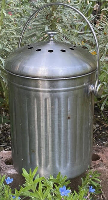 Even her compost bin is decorative.
