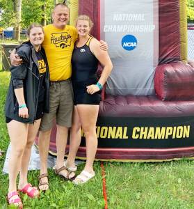 Carly Millerd courtesy photos 
Amalie Millerd (left) and Carly Millerd (right) enjoy their experience at NCAA rowing championships with their father Greg Millerd.