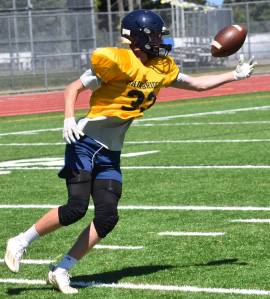 The Bainbridge Spartans finish a three-day summer camp on June 29. Nicholas Zeller-Singh/Kitsap News Group Photos