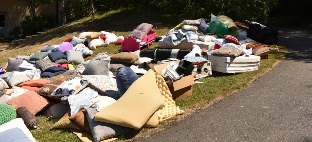 A mountain of pillows awaits takers who collect them and reuse the inserts for things like crafting projects.