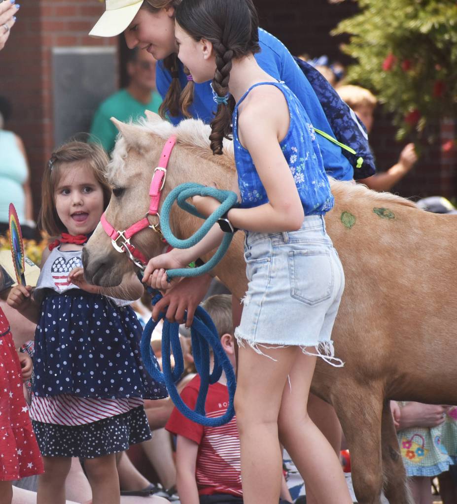 Kids had the opportunity to pet ponies during the Bainbridge 4th of July parade.