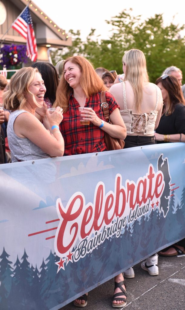 Friends and neighbors enjoy drinks in the beer and wine garden.
