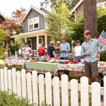 Neighbors on Madison Avenue enjoy lunch before the start on the July 4 parade. Nancy Treder/Kitsap News Group Photos