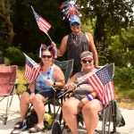 Visitors Gill Edward from Puerto Vallarta, Mexico, with Ann Walters and Lynn Wallum from Kingston visited Bainbridge Island to see the best parade in the Pacific Northwest.