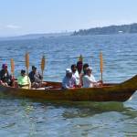 A canoe waits to go ashore.