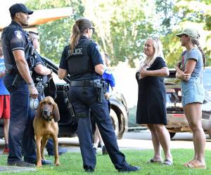 BIPD officers meet with the public at Town Center during National Night Out Aug. 1. Nancy Treder/Kitsap News Group Photos