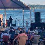 Third Stage, a Boston tribute band, performs outdoors and the cost was free at the Clearwater Casino's classic concert venue Aug. 3. Boats can be seen plying the waters in the background. Fans packed the site and enjoyed food and drinks, along with the music from just another band out of Boston. Steve Powell/Kitsap News Group Photos