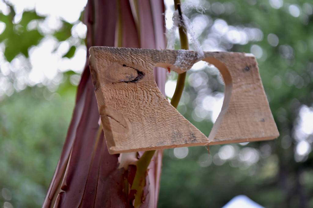 A silhouette remains of the wooden heart that was placed inside Pia the Peacekeeper during construction of the troll.