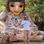 Nancy Treder/Kitsap News Group 
Recycle artist Thomas Dambo speaks about Pia the Peacekeeper troll that was made from recycled materials and completed by his team and community volunteers Aug. 18 at Sakai Park.
