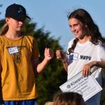 Nicholas Zeller-Singh/Kitsap News Group Photos
Ema Delecki and Lucy McRitchie fist bump after having two of the three highest combined points in all five recorded meets.