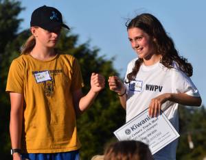 Nicholas Zeller-Singh/Kitsap News Group Photos
Ema Delecki and Lucy McRitchie fist bump after having two of the three highest combined points in all five recorded meets.