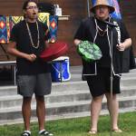 The Suquamish canoe families begin Chief Seattle Days with welcoming songs.