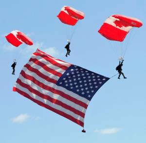 Elisha Meyer/Kitsap News Group
The Skyhawks present the American flag in a rehearsal jump.