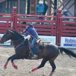 Port Orchards Aime Cross races for the finish line in the local barrel racing competition.
