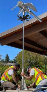 COBI courtesy photo
City workers put up a 7- by 6-foot dragonfly sculpture in front of Bainbridge Island City Hall recently. It is part of the annual Something New art rotation. The Prehistoric Dragonfly by Leon White is made from aluminum, glass and paint. White used vintage glass headlights that glow at night because he wanted its eyes to bulge out.