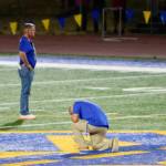 Bremerton High School assistant football coach Joe Kennedy prays alone at the 50-yard line, something hes fought to do again as a coach for eight years.