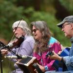 Members of the WHOZYAMAMA band perform a community concert at the Moritani Preserve.