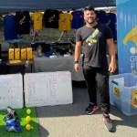 BI Rotary Courtesy photos
Alejandro Henao collects soccer supplies from Bainbridge Islanders and takes them to Colombia.