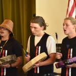 Nancy Treder/Kitsap News Group Photos
Bearon Old Coyote leads the Blessing Song with members of the dance and song group.