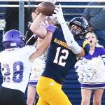 Nicholas Zeller-Singh/Kitsap News Group Photos
Luca Sheltens catches a 37-yard pass on the Spartans first play.